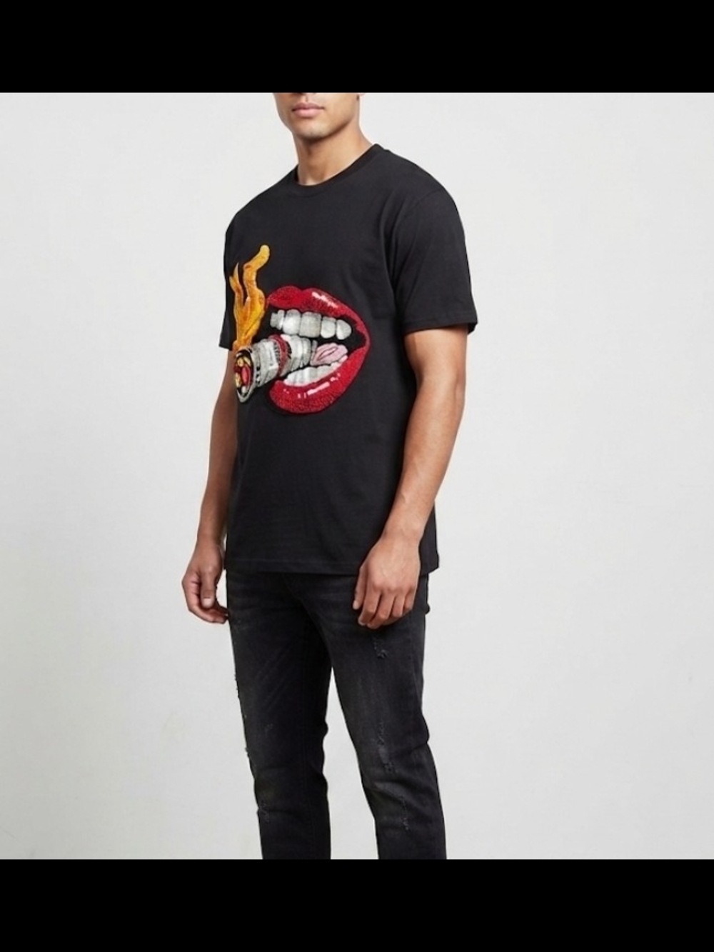 Reason Black Short-Sleeve Tee with Red Lip and Yellow Flame Graphic